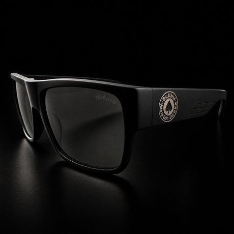 Motörhead Ace of Spades sunglasses, front three-quarter view with the Röad Crew lens print and Born to Lose Live to Win spade badge